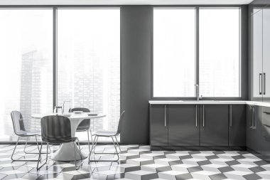 Yuvarlak masa ile panoramik gri mutfak