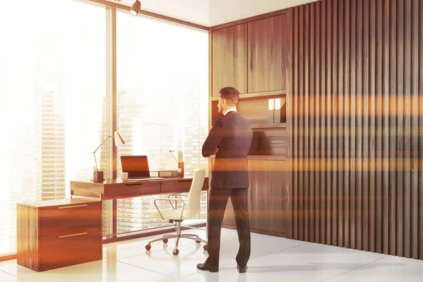 CEO standing in his wooden office — Stock Photo, Image