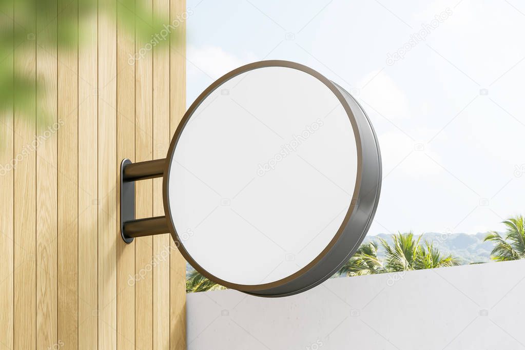 Round mock up sign on light wooden wall