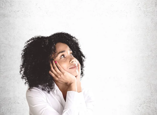 Dreaming young happy African woman, mock up — Stock Photo, Image