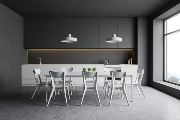 Gray kitchen with white counters and table — Stock Photo, Image