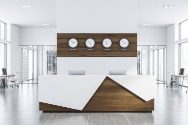 Ofiste beyaz ve ahşap resepsiyon masası