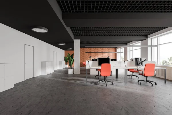 Orange and white office interior with doors