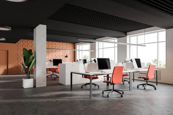 Orange and white open space office corner