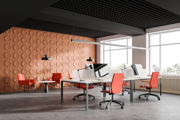 Φωτεινή πορτοκαλί γωνιά γραφείου με σαλόνι — Φωτογραφία Αρχείου