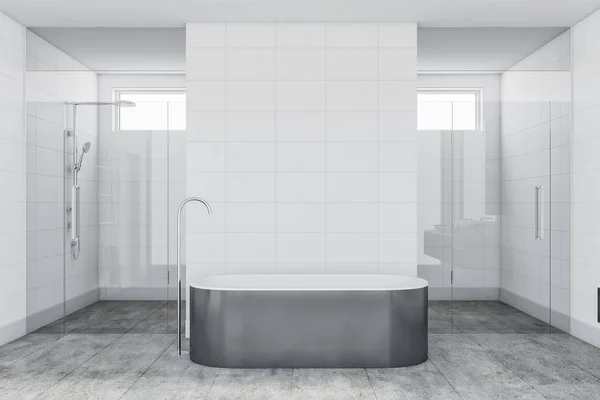 White tile bathroom interior with tub and shower