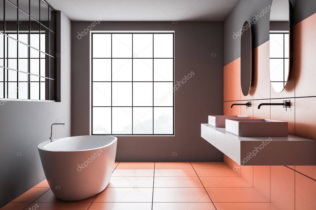 Gray and orange tile bathroom interior