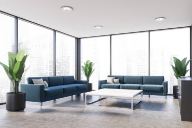 Mavi kanepeli panoramik ofis salonu