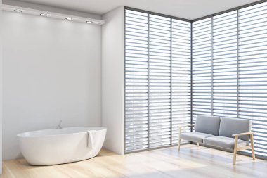 Küvet ve kanepe ile beyaz banyo köşesi