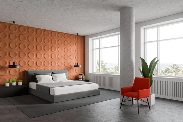 Orange and white bedroom corner with armchair — Stock Photo, Image