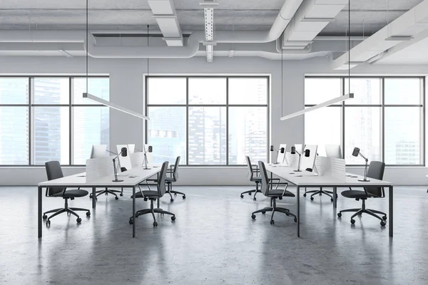 White empty industrial style office with windows