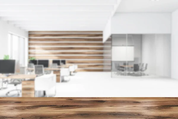 Wooden open space office and meeting room, blurred