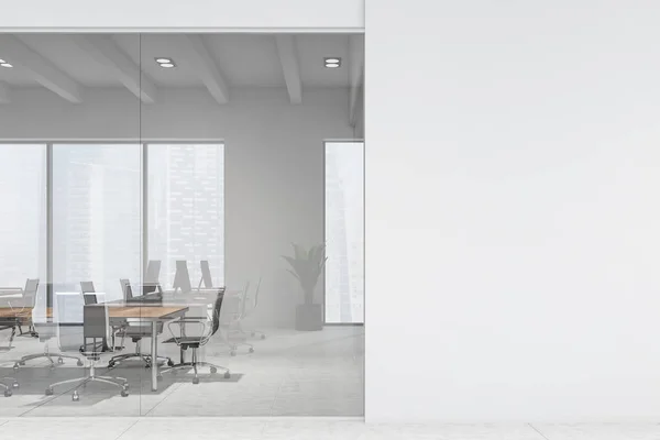 White meeting room with mock up wall