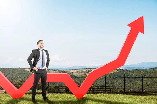Zelfverzekerde zakenman en groeiende grafiek — Stockfoto