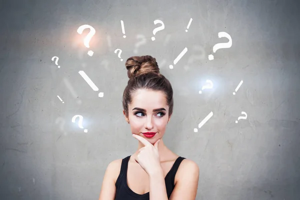 Woman with question and exclamation marks — Stock Photo, Image