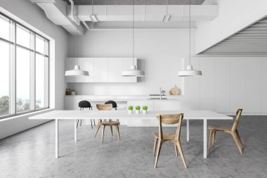 Masa ile beyaz mutfak iç