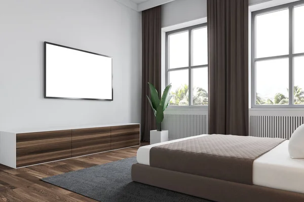 White bedroom with mock up TV screen