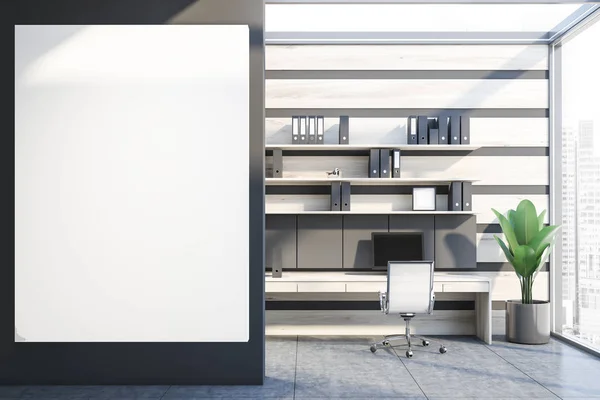 Gray and wooden office interior with poster