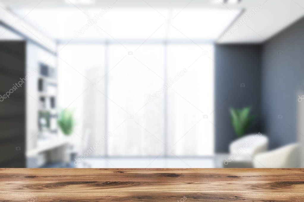 Blurred gray and wooden office with lounge