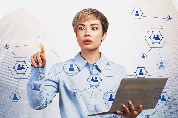 Woman working with social network icons — Stock Photo, Image