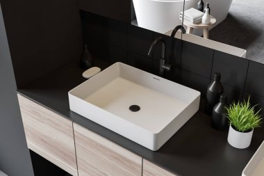 Gri banyoda lavabo üst görünümü