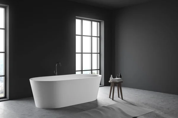 Grijze Loft badkamer hoek met ligbad — Stockfoto