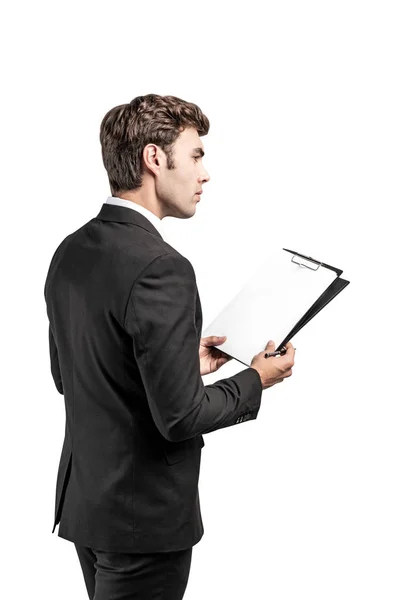 Side view of businessman with clipboard — Stock Photo, Image