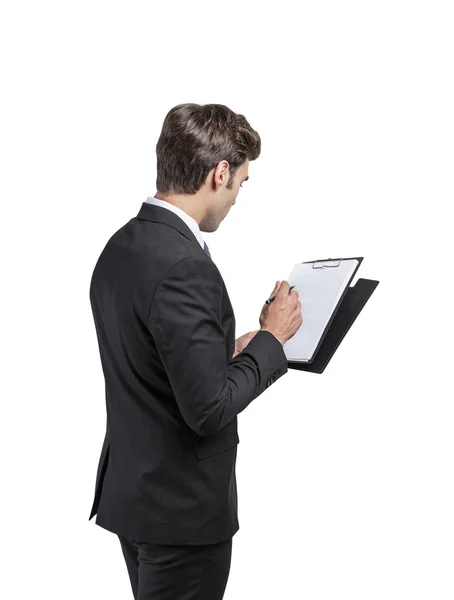 クリップボードに書き込むビジネスマンの背面図 — ストック写真