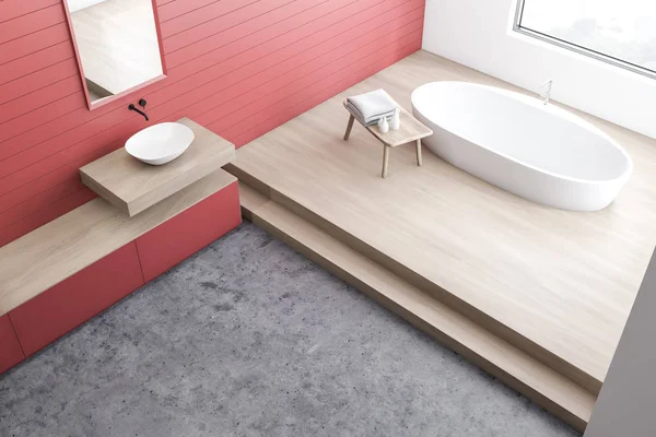 Widok z góry na czerwoną łazienkę, wanna i umywalka — Zdjęcie stockowe