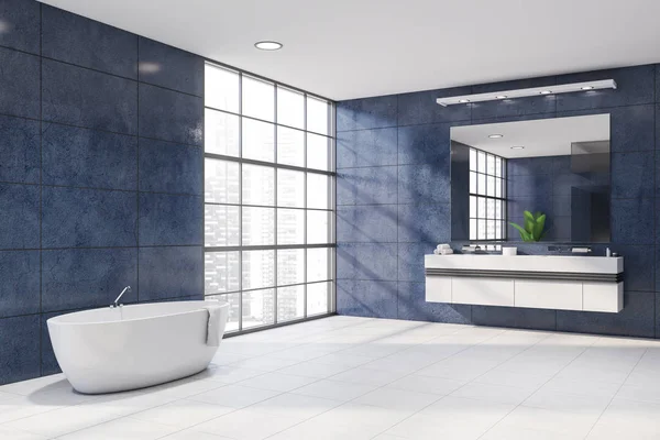 Luksusowy niebieski kącik łazienkowy z wanną i umywalką — Zdjęcie stockowe