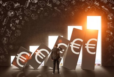 Düşen Euro grafiğine bakan adam