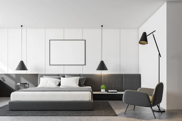 Dormitorio blanco con sillón y póster — Foto de Stock