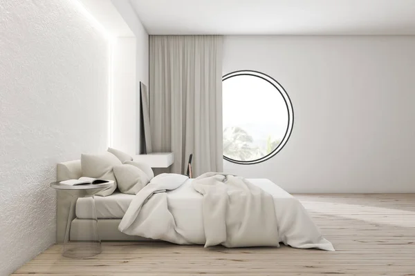 Side view of white bedroom with round window — Stock Photo, Image