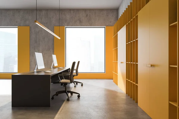 Side view of bright yellow loft office — Stock Photo, Image