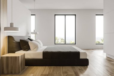 Minimalist beyaz yatak odasının yan görünüşü