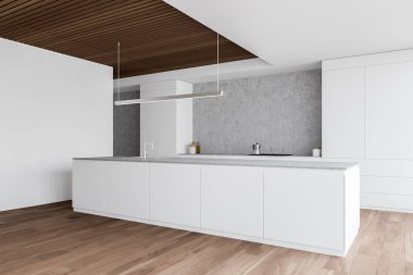 Saf beyaz ve ahşap mutfak tezgahları var.