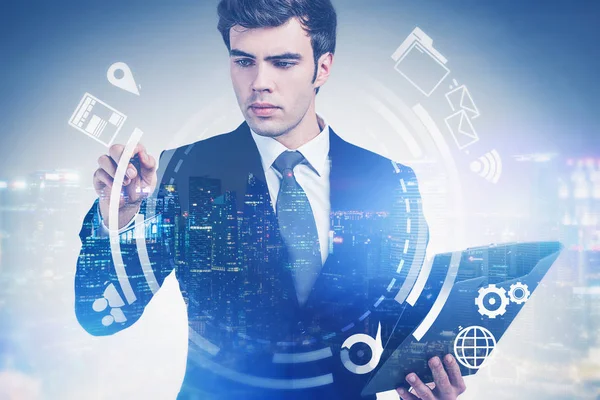 Serious businessman uses digital interface in city — Stock Photo, Image