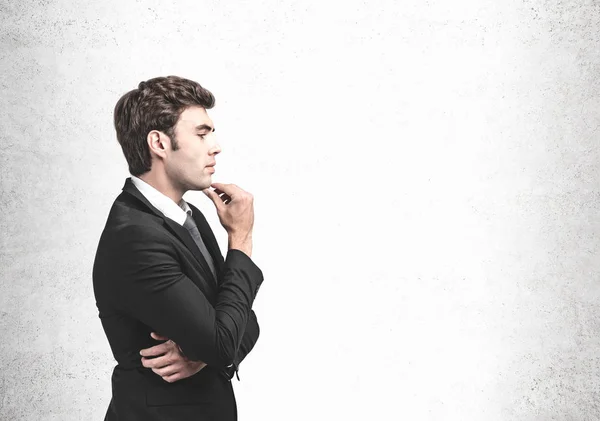 Side view of thoughtful young businessman, mock up — Stock Photo, Image