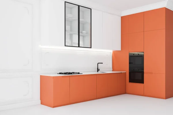 White kitchen corner with orange countertops