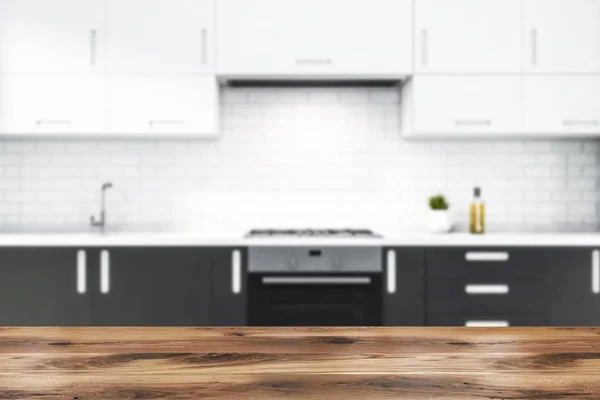 Blurry white brick kitchen with gray countertops — Stock Photo, Image