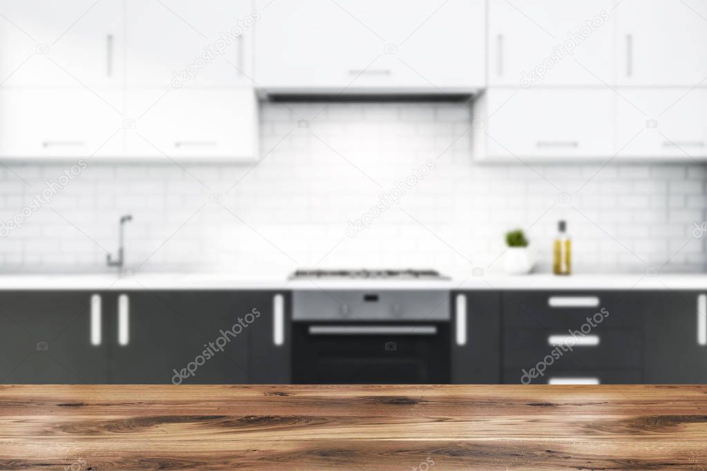 Blurry white brick kitchen with gray countertops
