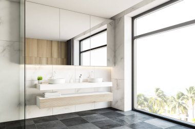 Çift lavabo beyaz mermer banyo köşesinde