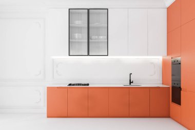 Turuncu tezgahlı beyaz mutfak