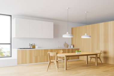 Ahşap ve beyaz mutfak köşesi, yemek masası.