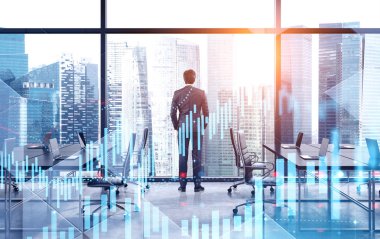 Ofiste çalışan genç bir komisyoncu, dijital grafikler