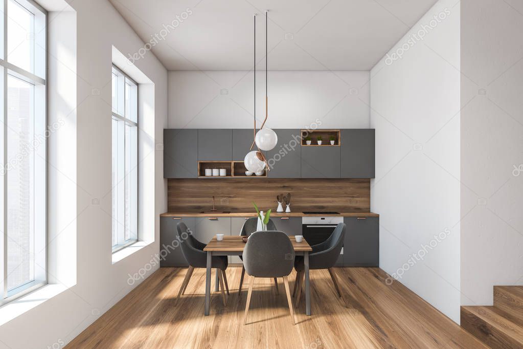 White and gray kitchen interior with table