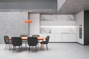 Turuncu masalı mermer ve beton mutfak.