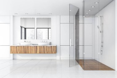 Lavabo ve duşla dolu beyaz banyo.