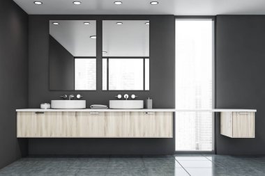 Gri banyo içi çift lavabolu.