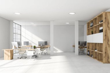 Kitaplığı olan modern beyaz açık uzay ofisi